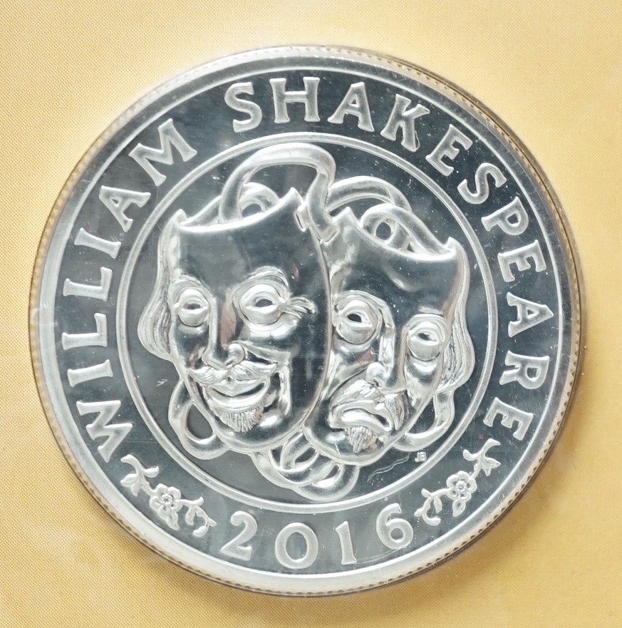A collection of mostly boxed collector's coins